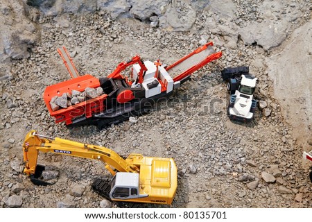 MOSCOW - APRIL 13: Large earth moving heavy equipment at the international exhibition of  the Mining and Processing of Metals and Minerals, MiningWorld on April 13, 2011 in Moscow