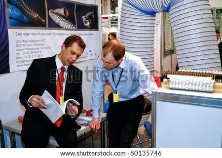 MOSCOW - APRIL 13: High-tech industrial hoses at the international exhibition of  the Mining and Processing of Metals and Minerals, MiningWorld on April 13, 2011 in Moscow