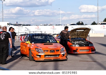 MOSCOW - AUGUST 25: Drift show Orange team at the international exhibition of  the auto and components industry, Interauto on August 25, 2011 in Moscow