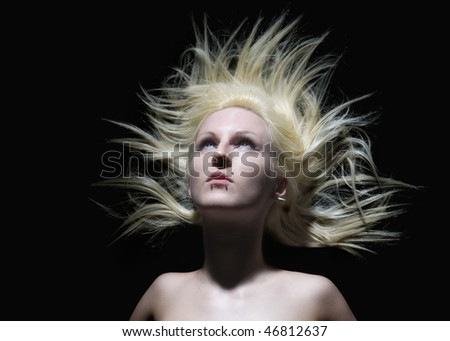 Beautiful blonde woman with piercings and crazy hair
