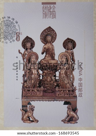 CHINA - CIRCA 2013:A stamp printed in China shows image of Gold Gileded Bronze buddhist statues,circa 2013