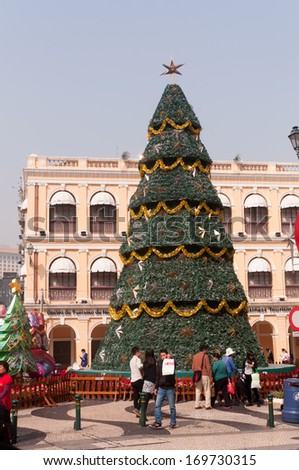 MACAU, MACAU - JANUARY 3,2014 - large Christmas tree in the centre of Senado Square of Macau. This square is the largest in Macau. Macau is a former Portuguese colony.