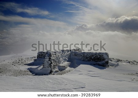 Helvellyn Summit shelter in winter