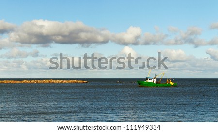 Fish ship in the dock of Baltic sea.