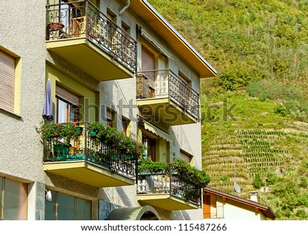 Beautiful house with balconies at the mountain with vineyard in Italy.