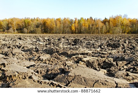 Season plowed field, horizontal photo.