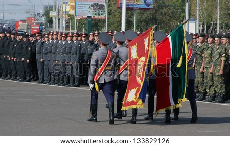 KAZAN, RUSSIA, AUGUST 21 - The police man do with a standard via police force formation on Tatar Police Days Festival on August, 21, 2009 in Kazan, Russia