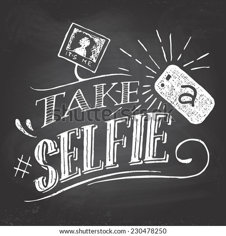 Take a selfie motivation quote hand-lettering on blackboard background with chalk