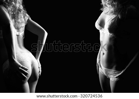 Closeups of a beautiful young woman in white lingerie, front and rear view, black and white photo in front of black studio background