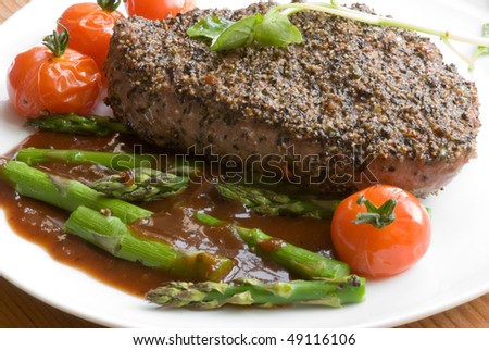 Peppered steak with gravy and vegetables