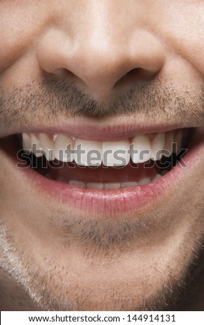 Full frame image of man smiling with perfect white teeth