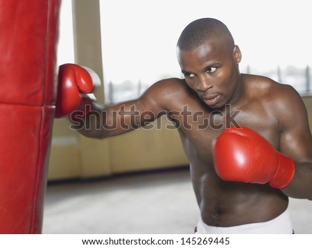 Similar – Image, Stock Photo Serious shirtless African American man with fists in studio