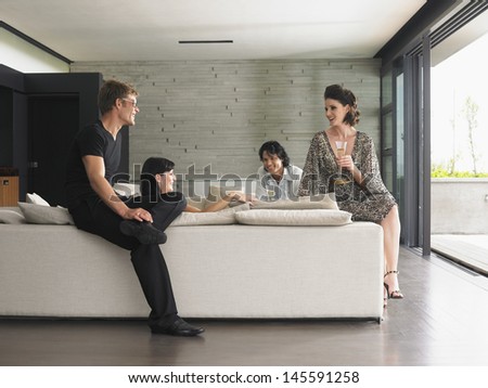 Similar – Image, Stock Photo Multiethnic modern women relaxing at coffee shop