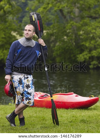 Similar – Image, Stock Photo Pensive man with paddle board before surfing