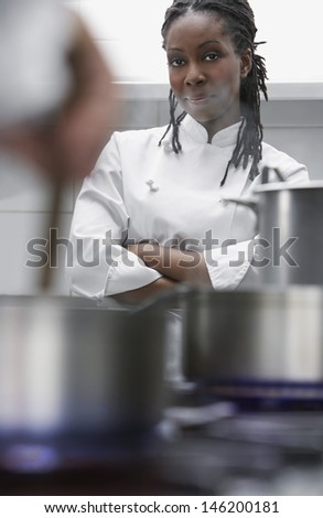 Portrait of an African American female chef in the kitchen