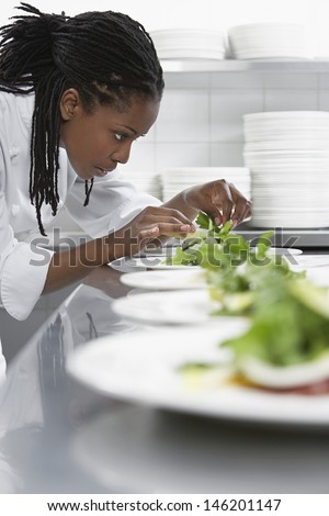 Similar – Foto Bild Crop-Köchin bei der Zubereitung von Steak Tartare