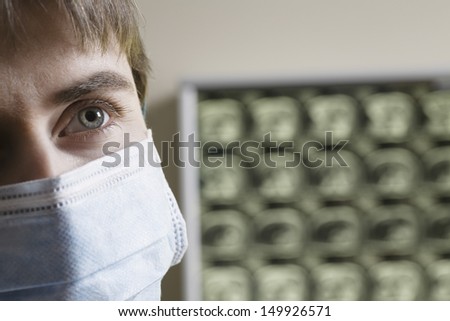 Closeup of a female doctor wearing surgical mask