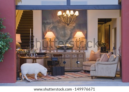 Sheep sculpture in entrance hallway by sitting area