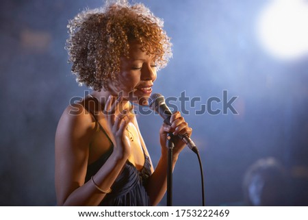 Similar – Image, Stock Photo Woman singing with microphone