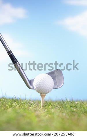 Golf Club Teeing Off Ball