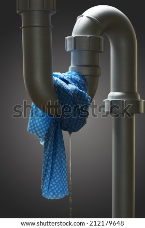 Leaking pipe with towel