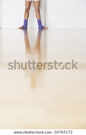 Ballet dancer and reflection, lower section
