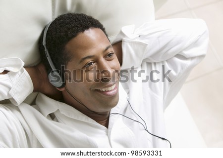 Man Listening to Music on Headphones