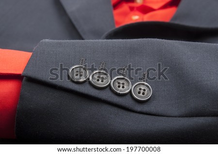 Mans suite sleeve with four buttons closeup