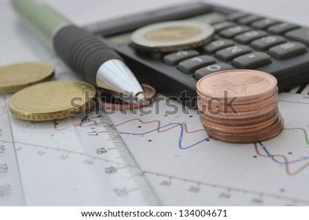 Business background with money, calculator and pen.