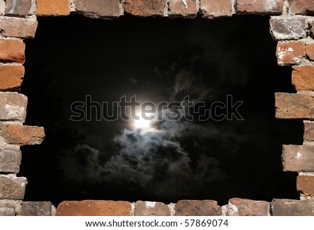 Old brick wall as a grungy frame with night heaven