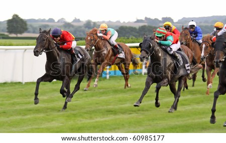 TRADITIONSRENNBAHN BAD DOBERAN, GERMANY - AUGUST 20: Jockeys during a qualifying race on August 20, 2010 in the scope of the \