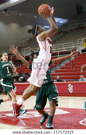 NEW YORK-NOV 3: St. John\'s Red Storm guard Keylantra Langley (20) shoots over the Farmingdale Rams at Carnesecca Arena on November 3, 2012 in Jamaica, Queens, New York.