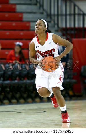 NEW YORK-NOV 3: St. John\'s Red Storm guard Eugeneia McPherson (22) looks to pass the ball against the Farmingdale Rams at Carnesecca Arena on November 3, 2012 in Jamaica, Queens, New York.