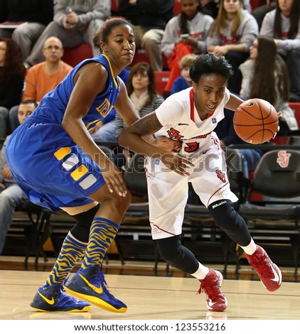 JAMAICA, NY-JAN 2: St. John\'s Red Storm guard Shenneika Smith (35) drives to the net against the Delaware Blue Hens at Carnesecca Arena on January 2, 2013 in Jamaica, Queens, New York.