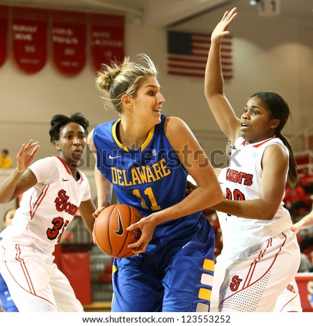 JAMAICA, NY-JAN 2: Delaware Blue Hens guard Elena Delle Donne (11) shoots around St. John's Red Storm guard Keylantra Langley (20) at Carnesecca Arena on January 2, 2013 in Jamaica, New York.