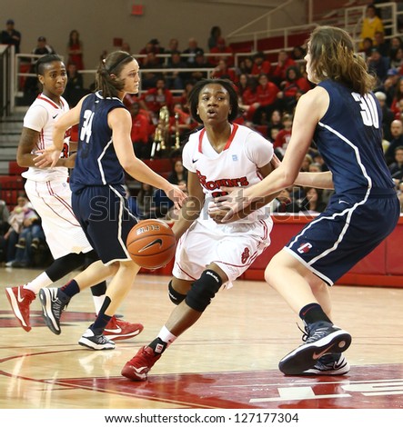 JAMAICA-FEB 2: St. John\'s Red Storm guard Aliyyah Handford (3) dribbles around Connecticut Huskies forward Breanna Stewart (30) at Carnesecca Arena on February 2, 2013 in Jamaica, Queens, New York.
