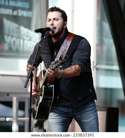 NEW YORK-AUG 22: Country music singer Tyler Farr performs at Fox and Friends\' All-American Summer Concert Series on the corner of 48th Street and 6th Avenue on August 22, 2014 in New York City.