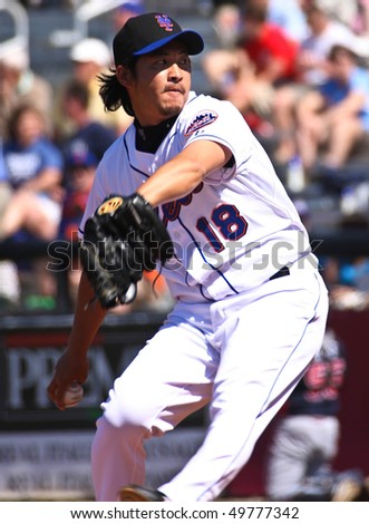 PORT ST. LUCIE, FLORIDA - MARCH 23: New York Mets pitcher Ryota Igarashi hurls a ball to the plate during the game against the Atlanta Braves on March 23, 2010 in Port St. Lucie, Florida.