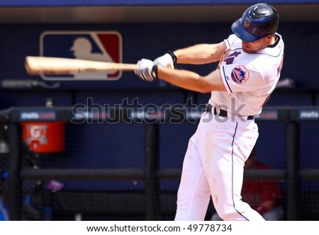 PORT ST. LUCIE, FLORIDA - MARCH 24: New York Mets first baseman Daniel Murphy hits a home run during a spring training game against the Houston Astros on March 24, 2010 in Port St. Lucie, Fla.