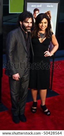 Talk show host Rachael Ray and her husband, John Cusimano, attend the movie premiere of \