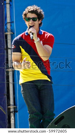 FLUSHING, NY - AUGUST 28: The Jonas Brothers perform at Arthur Ashe Kids' Day at the Billie Jean King National Tennis Center on August 28, 2010 in Flushing, New York.
