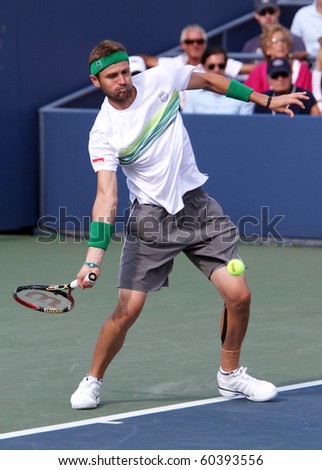 FLUSHING, NY - SEPTEMBER 4: Mardy Fish (USA) returns a volley during men\'s singles during the US Open Tennis Tournament at Billie Jean King National Tennis Center on September 4, 2010 in Flushing, NY.