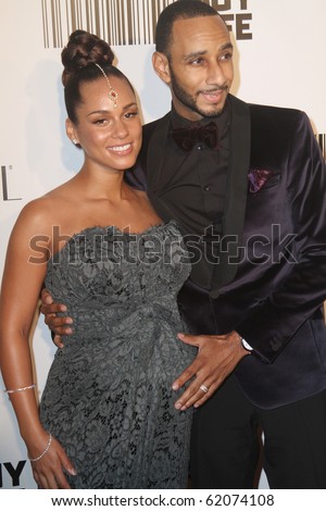 NEW YORK - SEPTEMBER 30: Singer Alicia Keys attends the Keep A Child Alive\'s Black Ball at the Hammerstein Ballroom with her husband, Swizz Beatz, on September 30, 2010 in New York City.