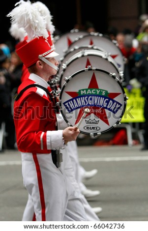 NEW YORK - NOVEMBER 25: Marching band drummers attend the 84th Macy\'s Thanksgiving Day Parade on November 25, 2010 in New York City.