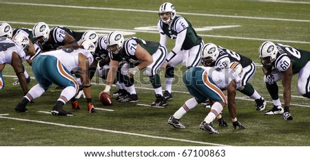 EAST RUTHERFORD - DECEMBER 12: New York Jets quarterback Mark Sanchez calls out a play against the Miami Dolphins at Meadowlands Stadium on December 12, 2010 in East Rutherford, NJ.