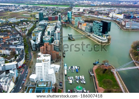 Similar – Image, Stock Photo aerial view of dusseldorf at sunset with the Rheinknie Bridge