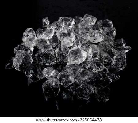 ice cubes on black background.  Beautiful Ice cubes. White crystals on a black background +