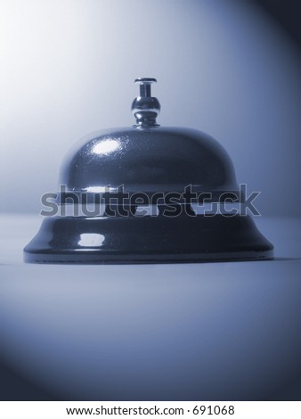 A photo of a bell used to solicit service