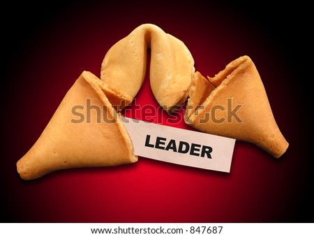 A photo of a fortune cookie with a leader theme