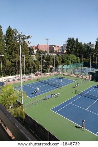 A tennis court on a college campus